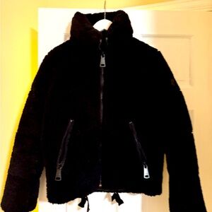 Sam jacket like new worn 2 times. Size small. Black soft fuzzy on outside.